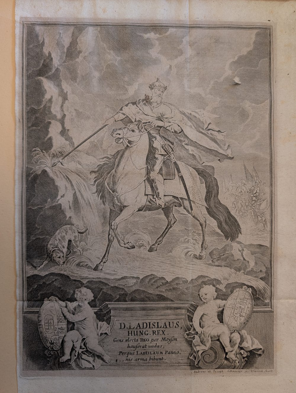 Engraved equestrian portrait of St Ladislaus I of Hungary, crowned and cloaked, striking a rock with his lance as a dog drinks from the spring below; two putti hold heraldic shields on the pedestal beneath.