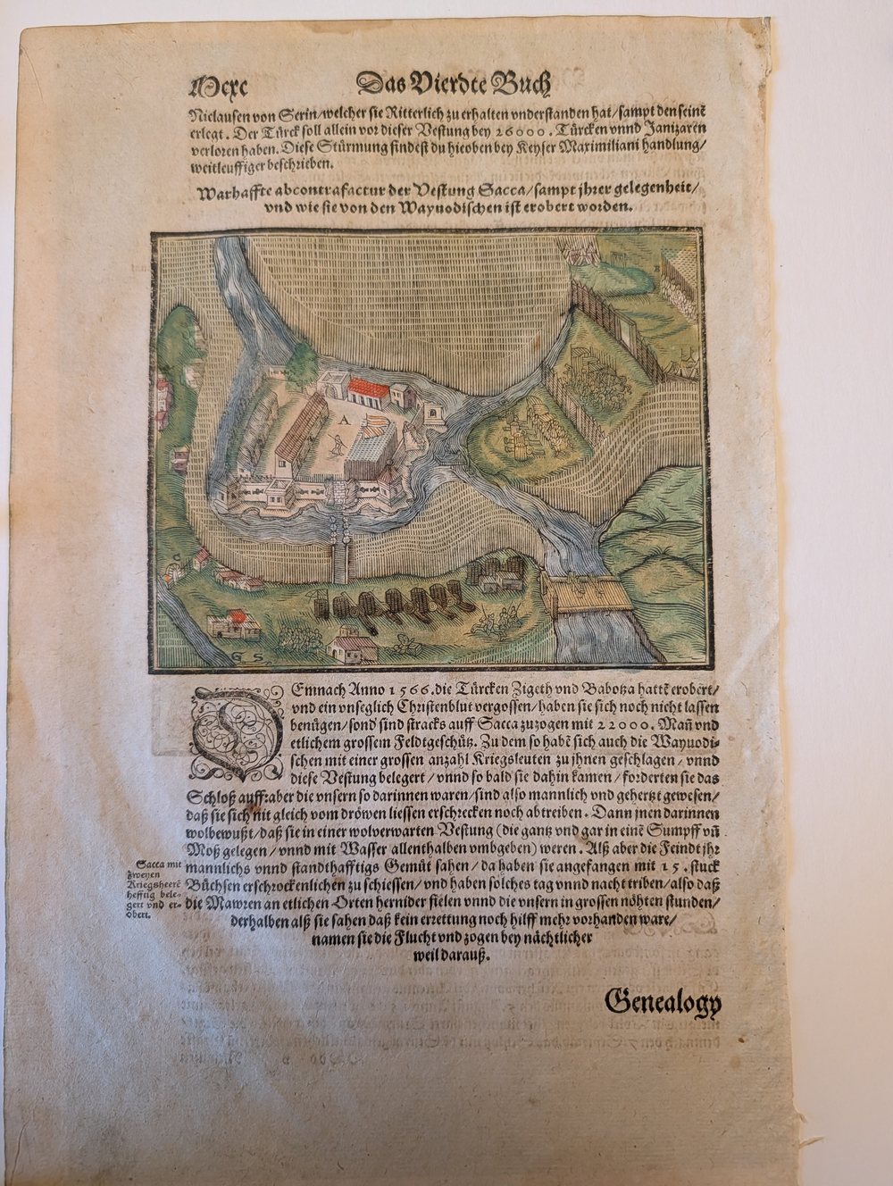 Hand-coloured woodcut view of the water-castle of Sacca on its river island, with a gun line and bridge below, set in a page of German blackletter text.